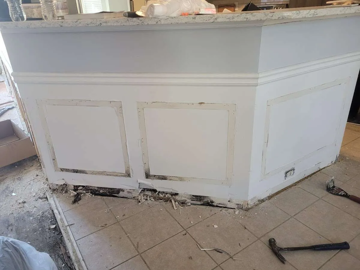 Water damage and mold on kitchen during Storm Damage Restoration in Massanetta Springs